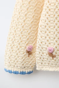VESTE BRODÉE POMPONS