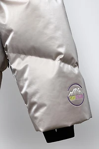 DOUDOUNE EN PLUME ET DUVET MÉTALLISÉE WATER RESISTANT COUPE-VENT SYSTÈME RECCO® COLLECTION SKI