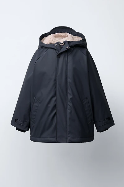 BLOUSON DÉPERLANT GOMMÉ