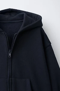 SWEAT ZIPPÉ À CAPUCHE