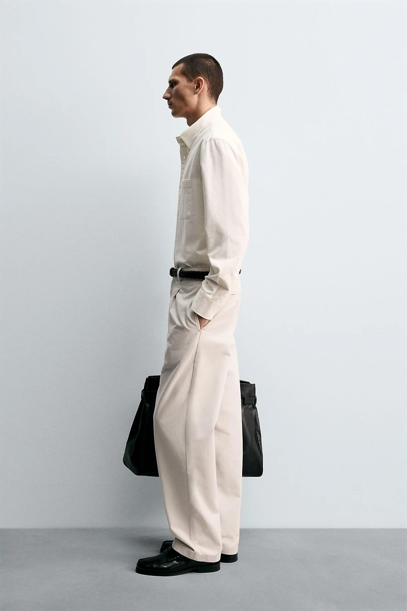 RELAXED FIT PLEATED PANTS
