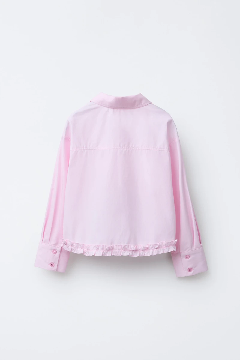 RUFFLED HEM SHIRT