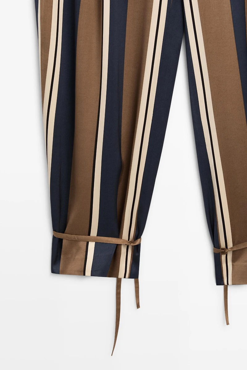 Satin pants with tie-up hem detail