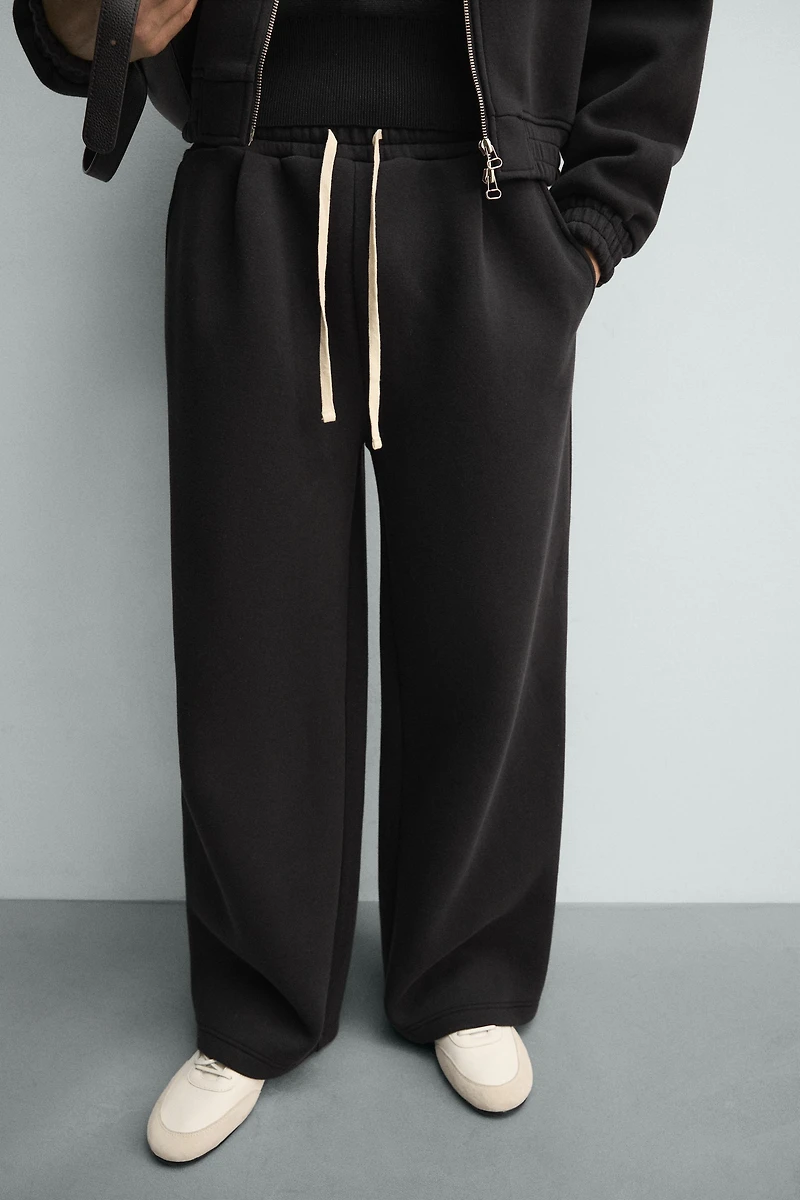 TECHNICAL PLEATED JOGGER PANTS