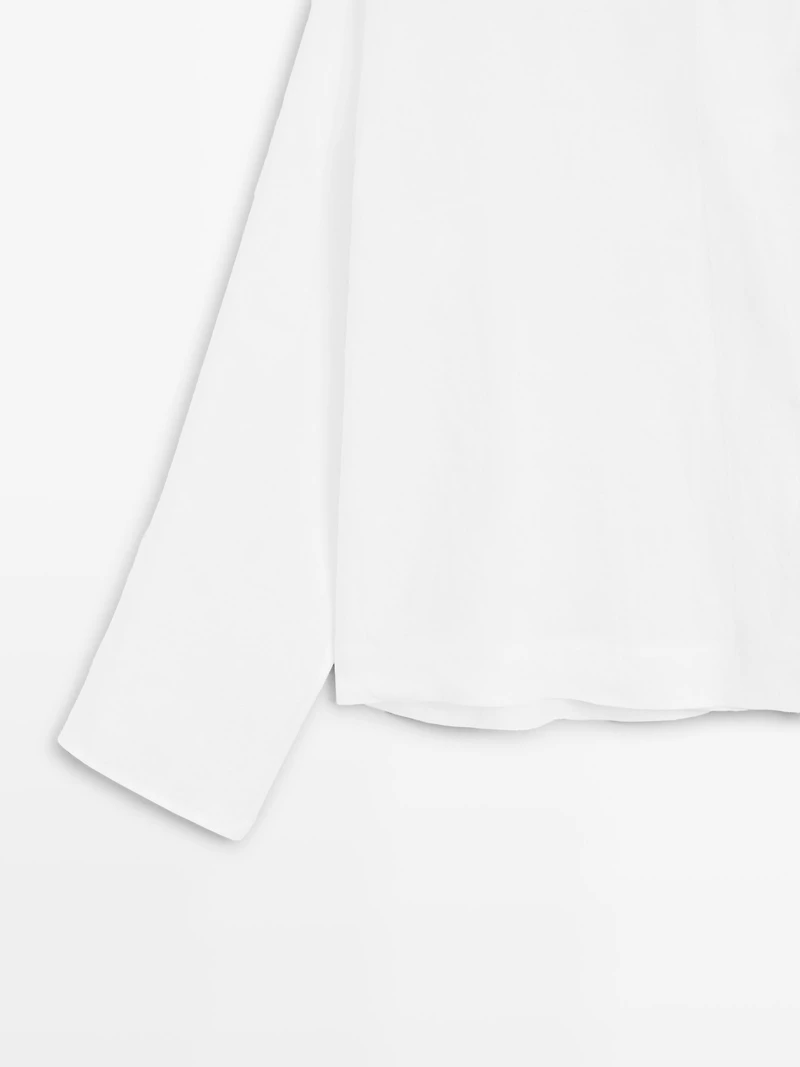 Flowing linen blouse with surplice neckline