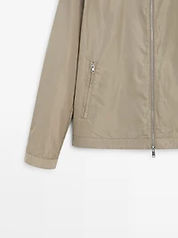 Short technical fabric jacket