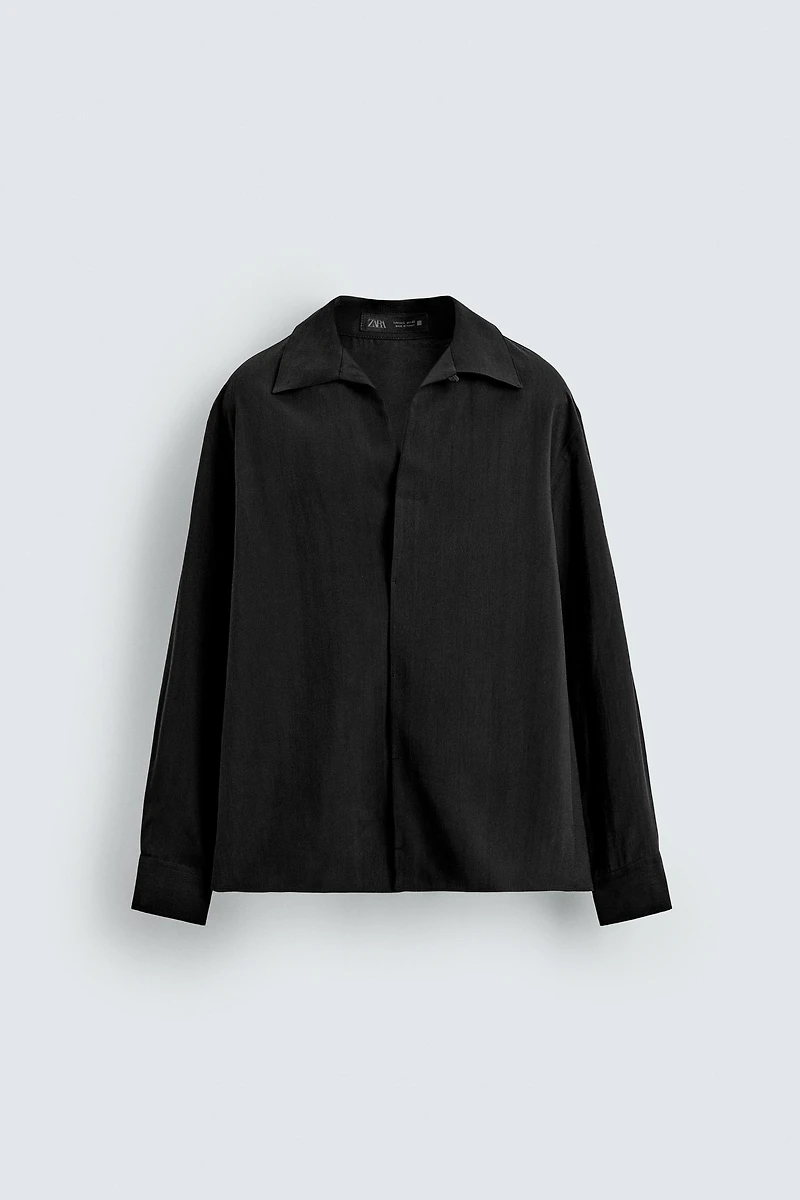 FLOWY POLO SHIRT
