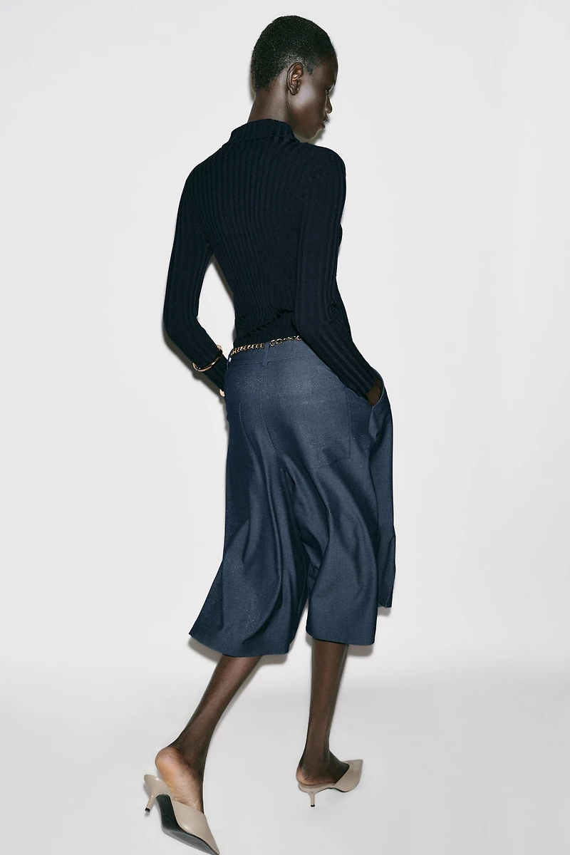BELTED CHAIN LONG SHORTS