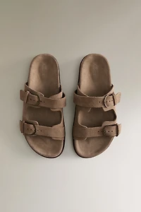 SANDALES PLATES CUIR BOUCLES