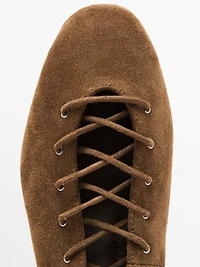 Lace-up high heel shoes
