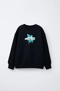 STAR PRINT SWEATSHIRT