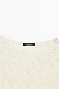 Sleeveless open-knit top