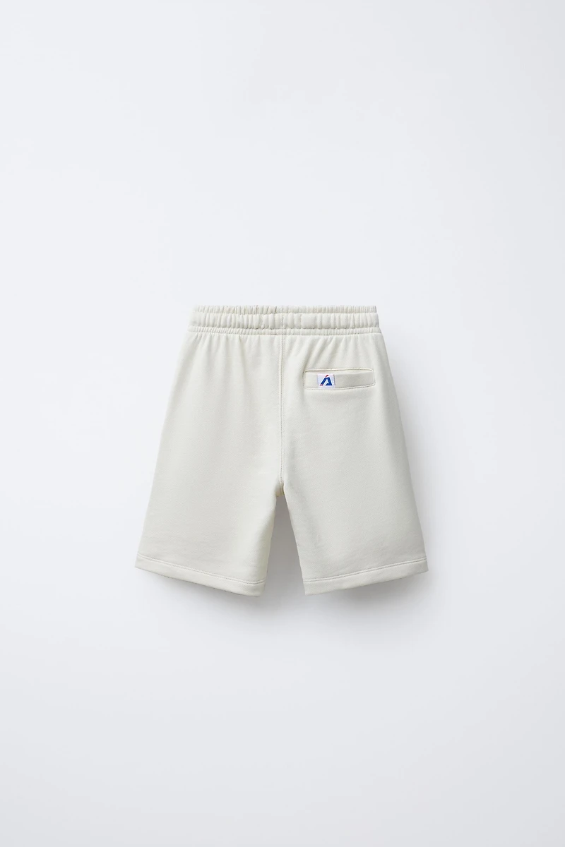 JOGGING SHORTS WITH LABEL