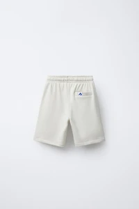JOGGING SHORTS WITH LABEL