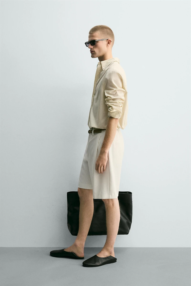 RELAXED FIT SIDE PLEAT SHORTS