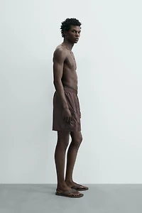 LONG CARGO SWIM TRUNKS