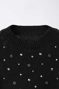 PULL EN MAILLE AVEC CUT OUT ET STRASS