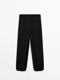 Wool sarouel trousers with tie detail