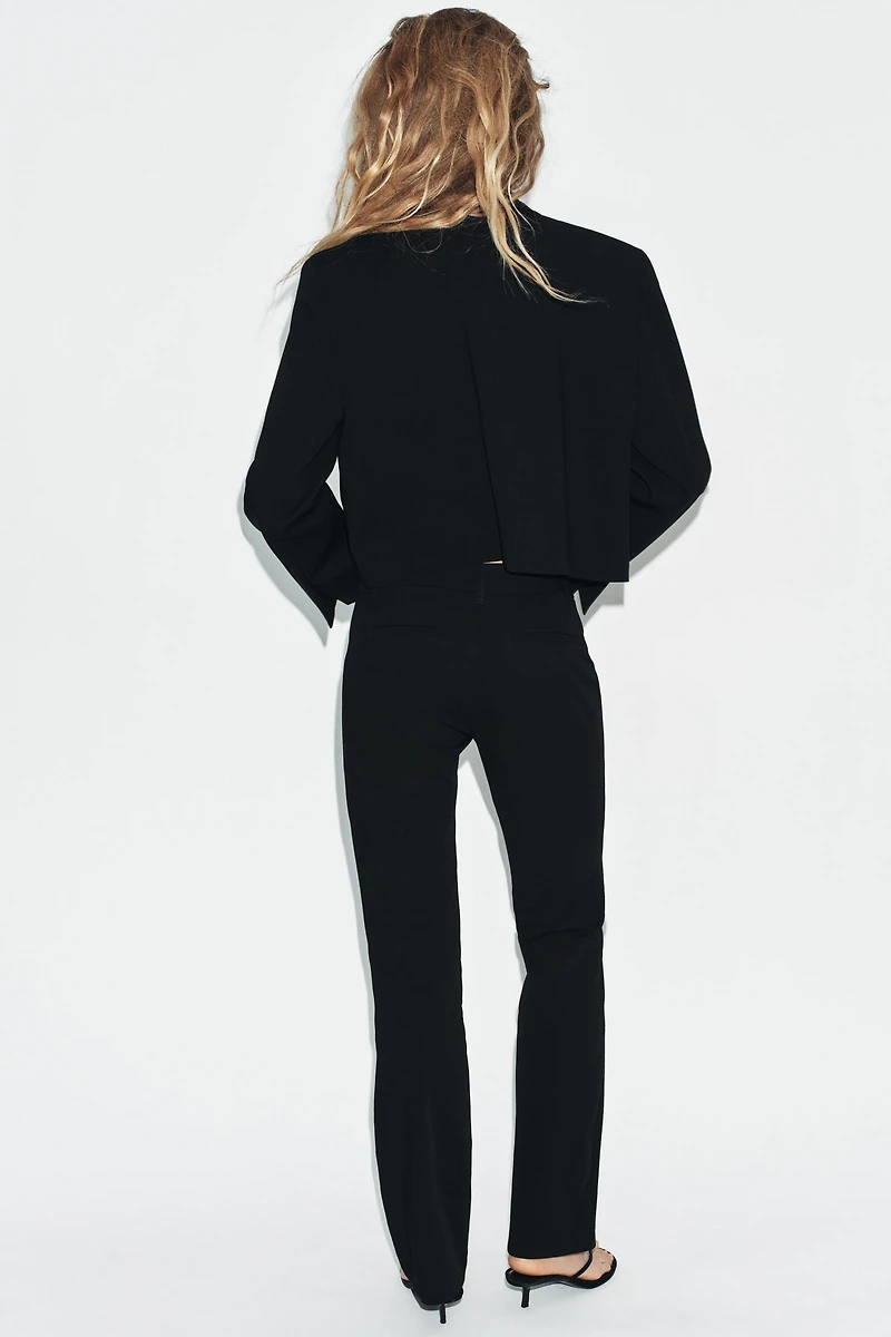 PANTALON FLARE À PASSANTS