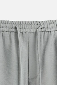FLOWY RELAXED FIT BERMUDA SHORTS