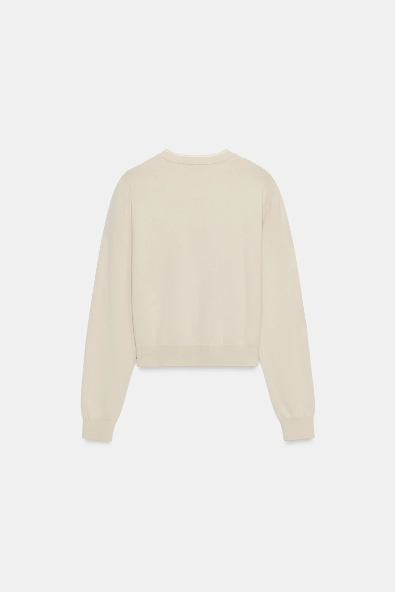VESTE EN MAILLE BIMATIÈRE