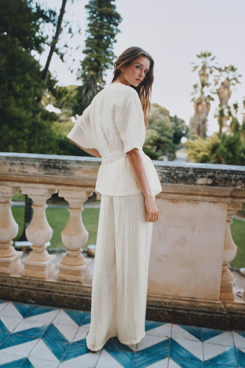 BELTED TOP WITH BUCKLE