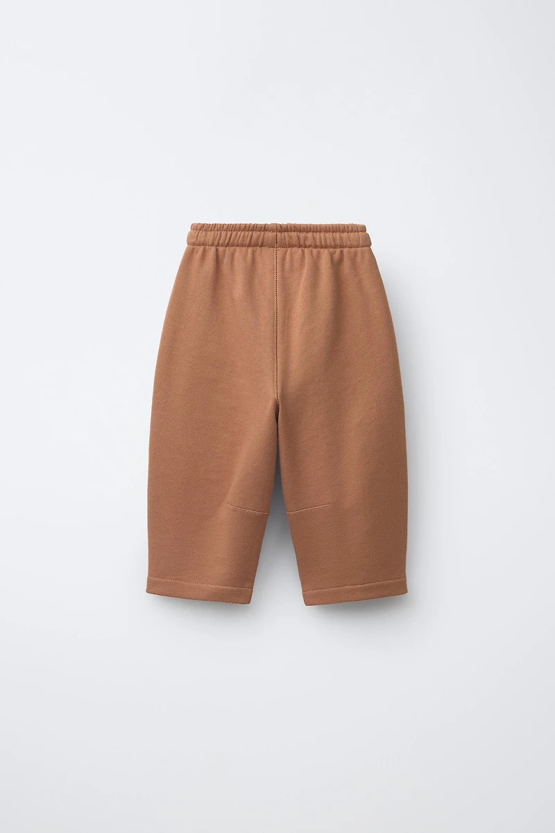 PANTALON EN MOLLETON ANIMAUX BRODÉS