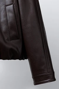 BLOUSON EN MATIÈRE SYNTHÉTIQUE