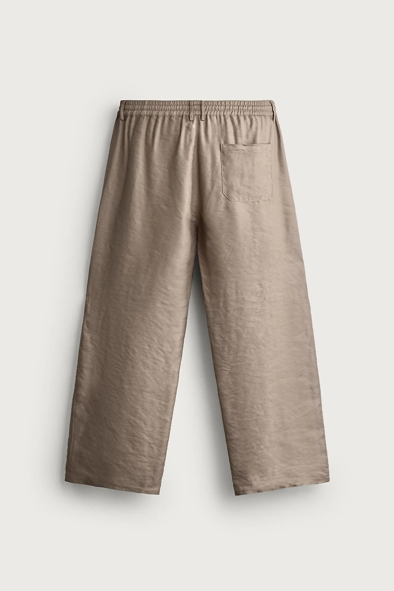 RELAXED FIT FLOWY PANTS