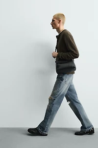 FLARE FIT RIPPED JEANS