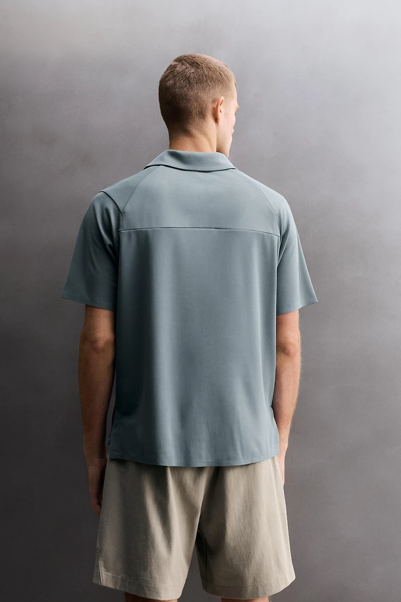 TECHNICAL PIQUÉ TRAINING POLO