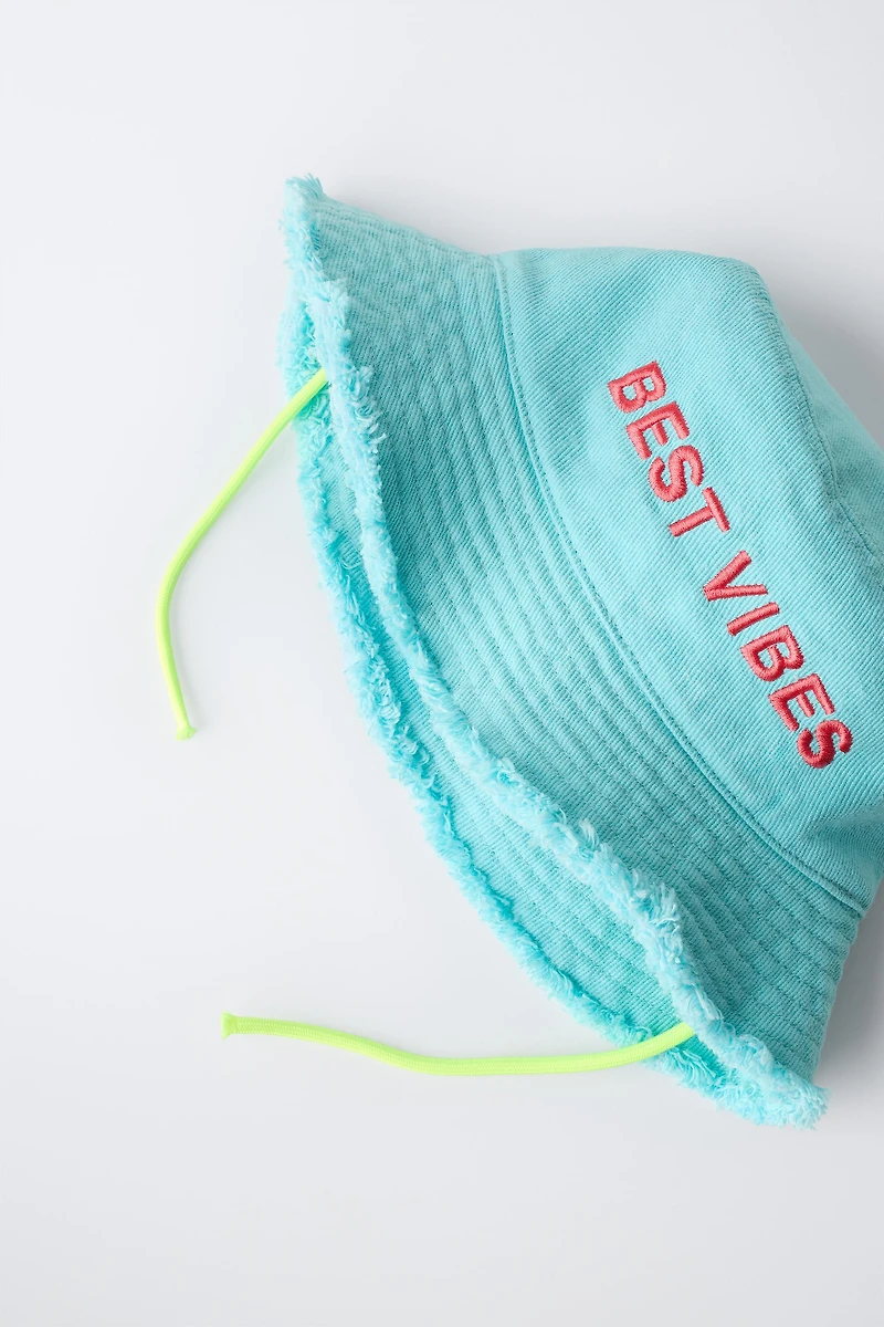 EMBROIDERED TEXT BUCKET HAT