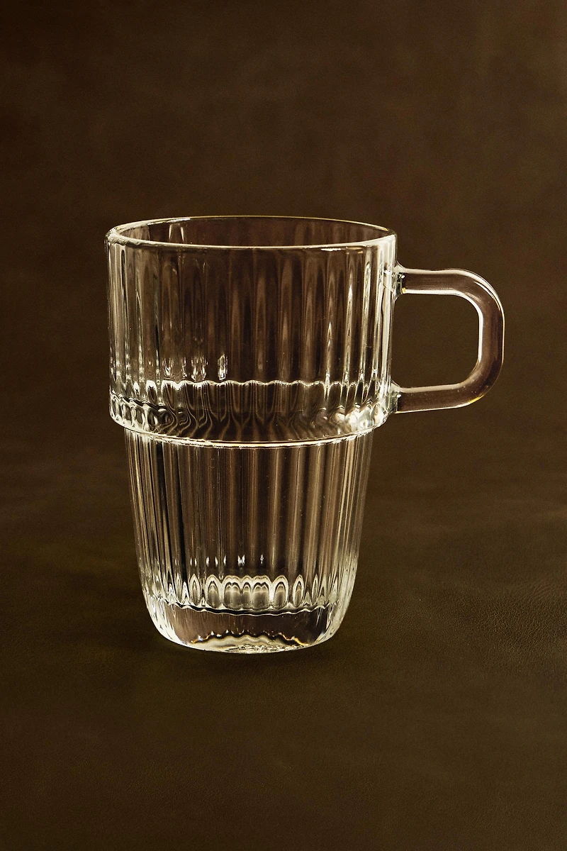 GLASS MUG WITH A RAISED DESIGN