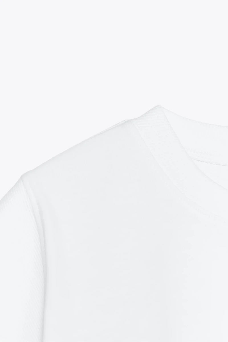 T-SHIRT SANS MANCHES EFFET DÉLAVÉ