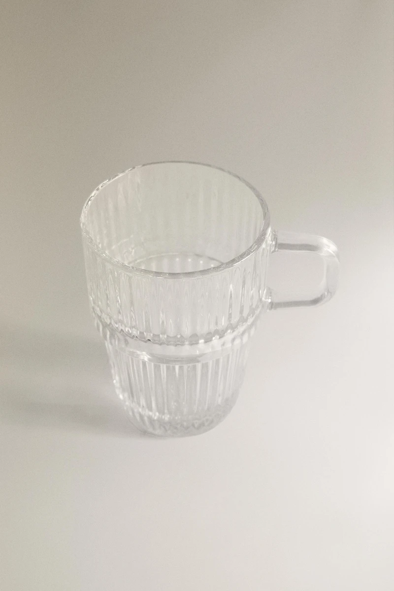 GLASS MUG WITH A RAISED DESIGN