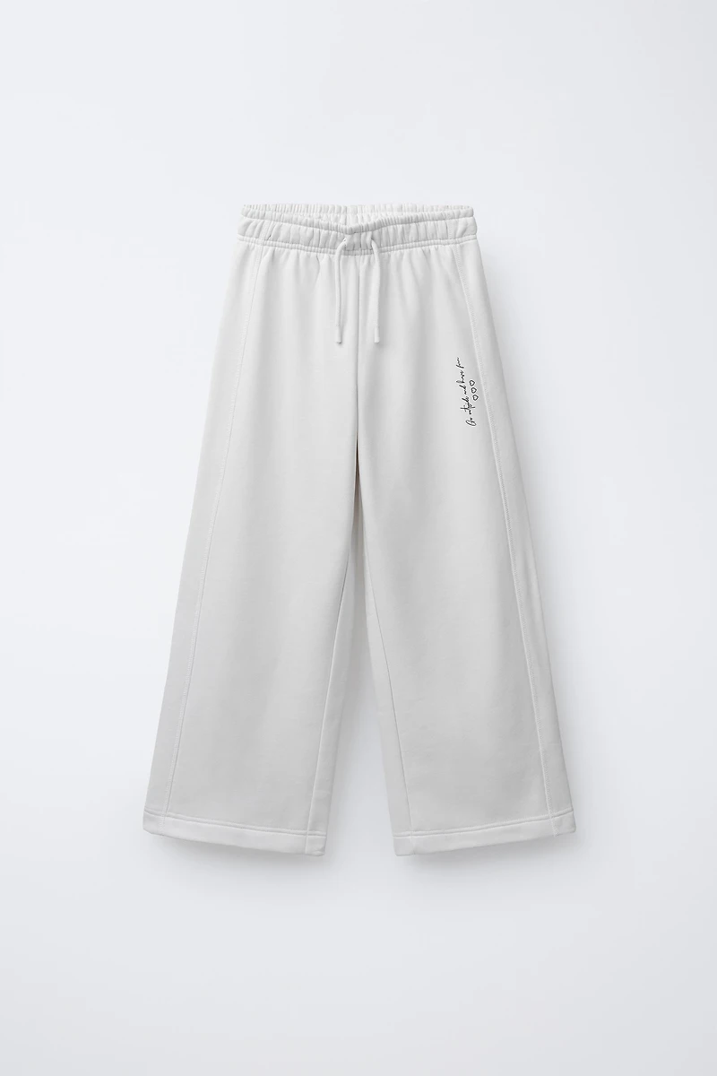 TEXT PRINT WIDE LEG PANTS