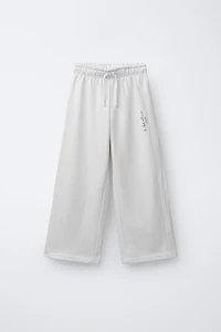 TEXT PRINT WIDE LEG PANTS