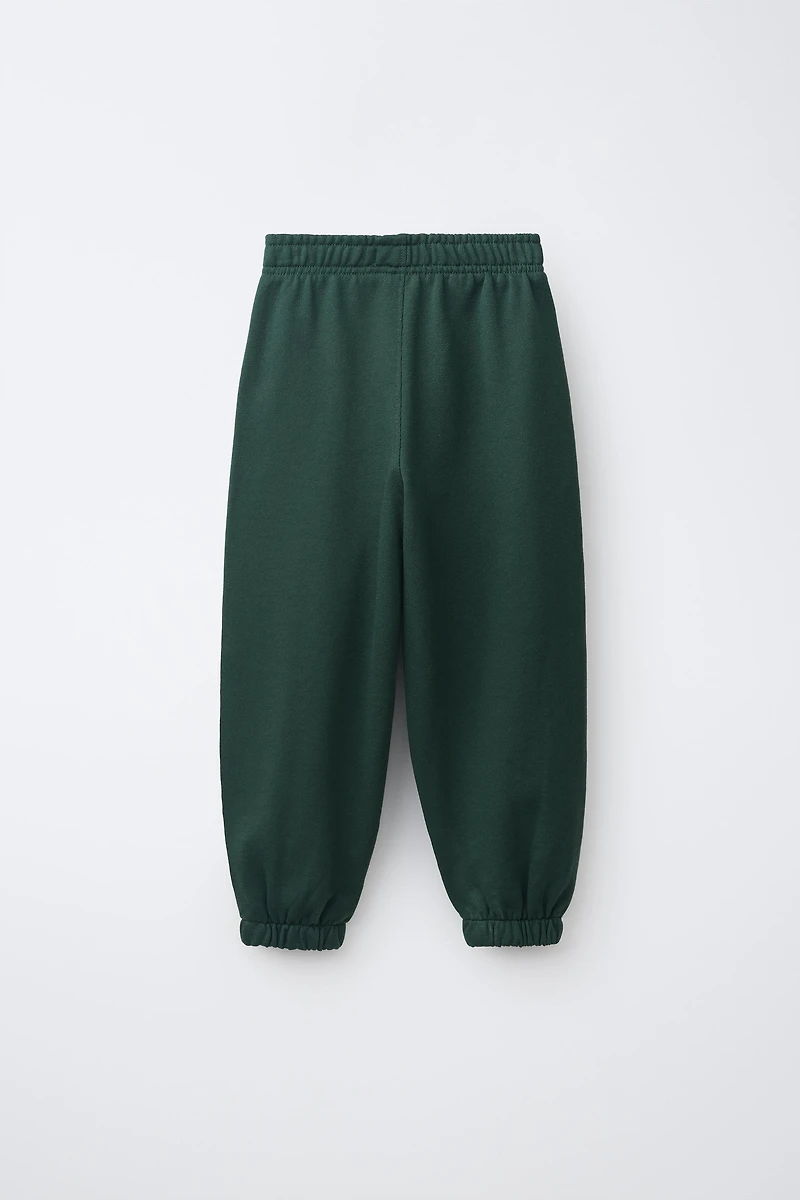 ENSEMBLE EN MOLLETON SWEAT ET PANTALON AVEC BANDES