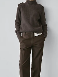 Knit sweater with shoulder detail