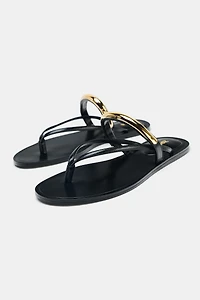 SANDALS WITH METALLIC APPLIQUÉ