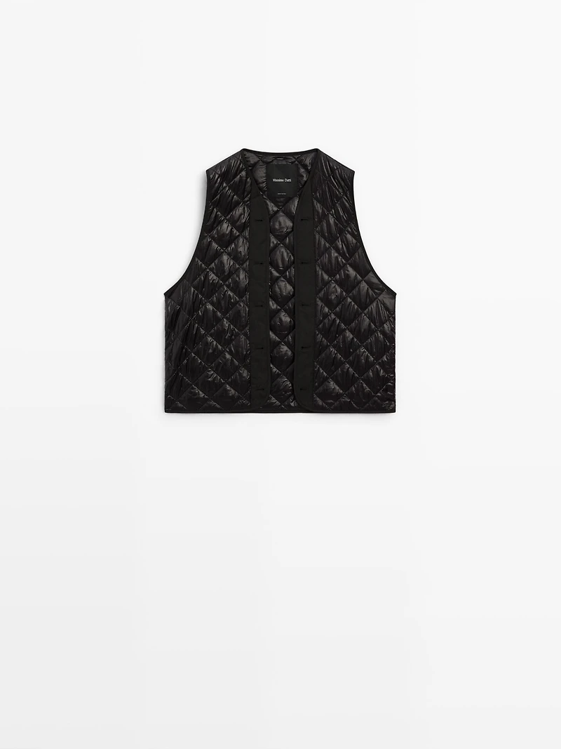 Water-repellent parka with detachable inner gilet