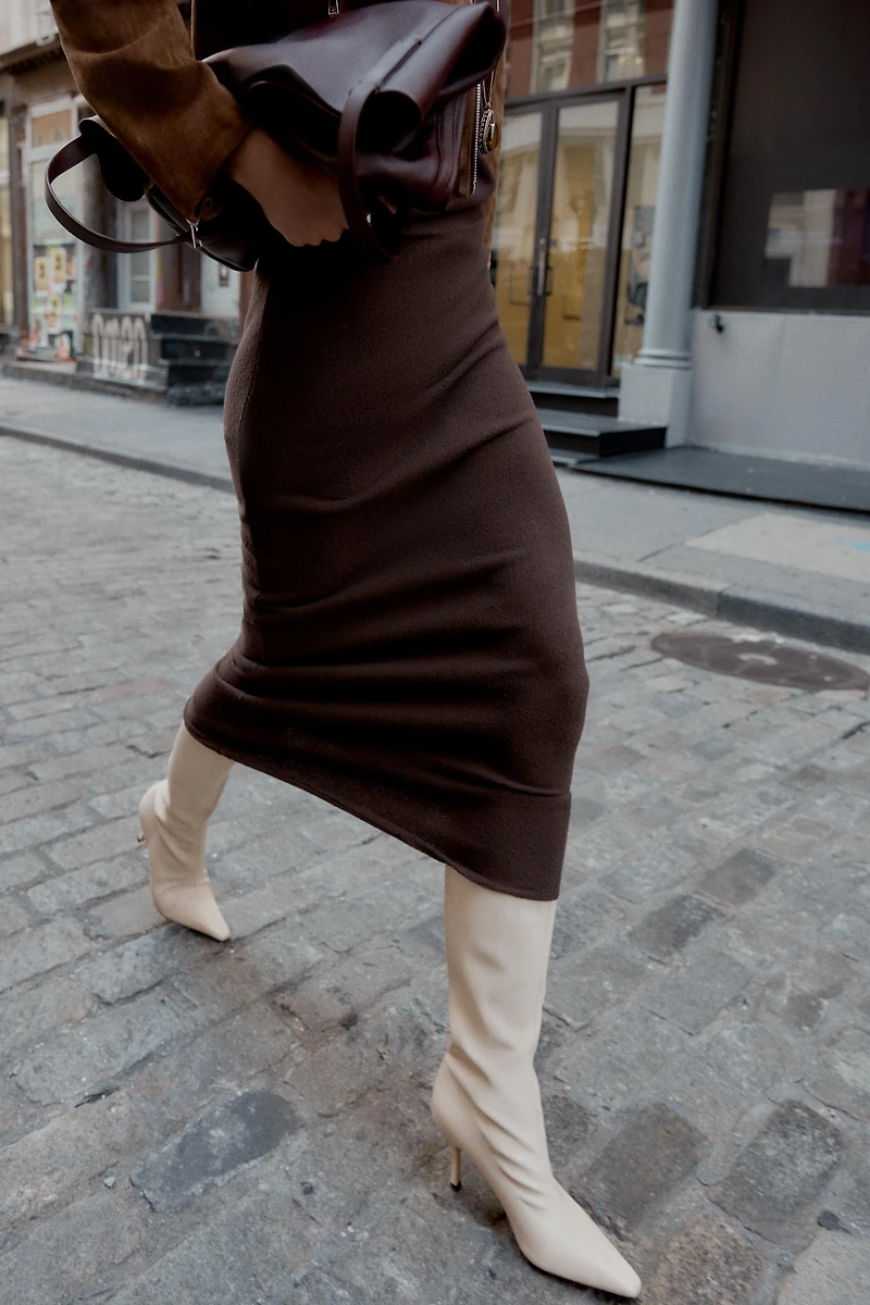 CUT-OUT KNIT MIDI SKIRT
