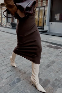CUT-OUT KNIT MIDI SKIRT