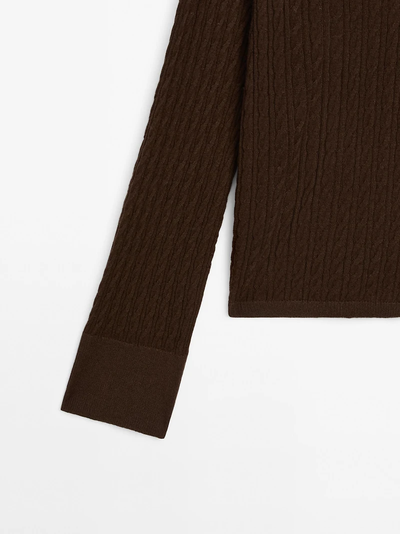 V-neck cable-knit sweater