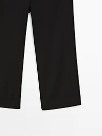 Capris with button details