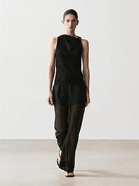 Draped neckline top with brooch detail