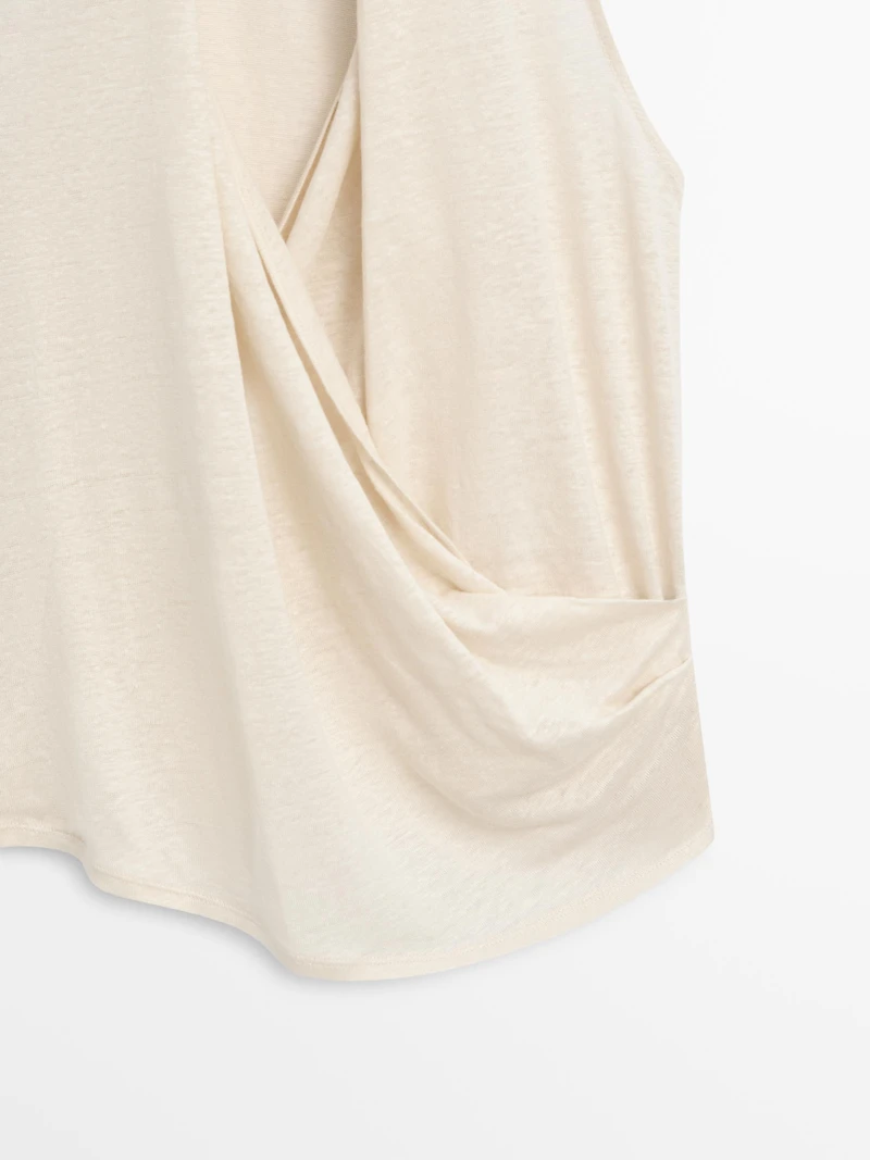Surplice top with draped detail