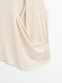 Surplice top with draped detail