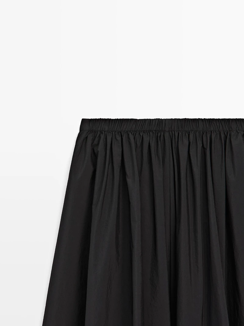 Jupe midi en tissu technique