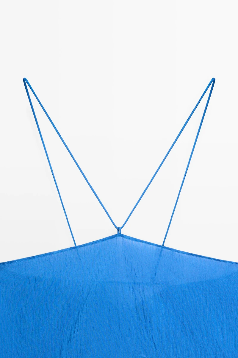Flowing halter top with tie detail